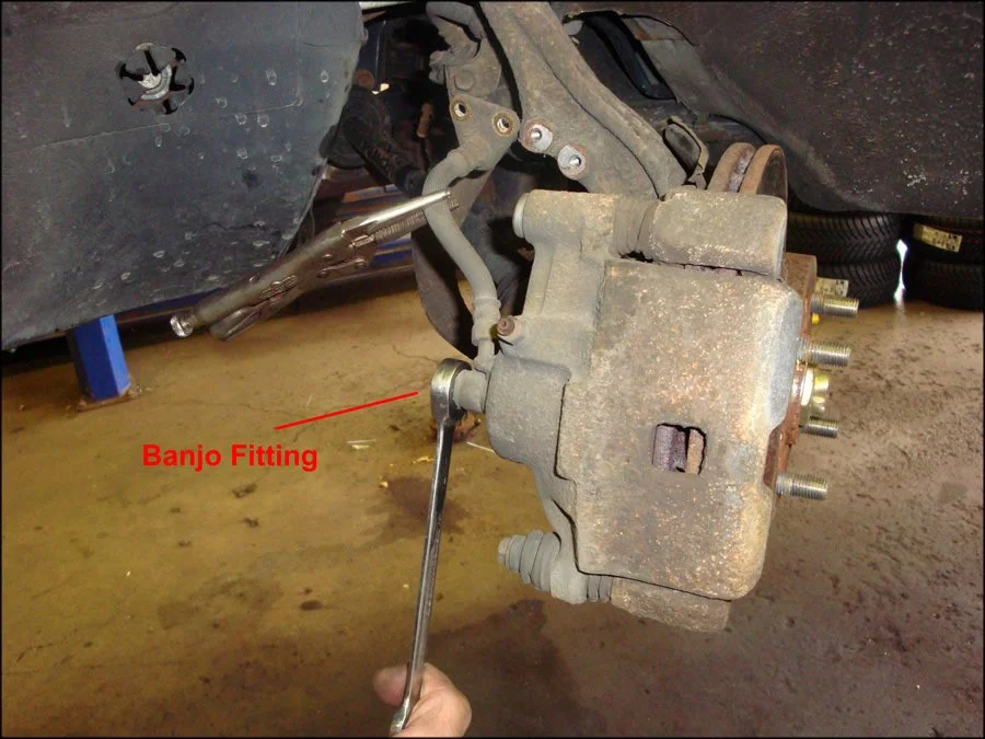 brake-caliper-hose-loosen-113618.webp