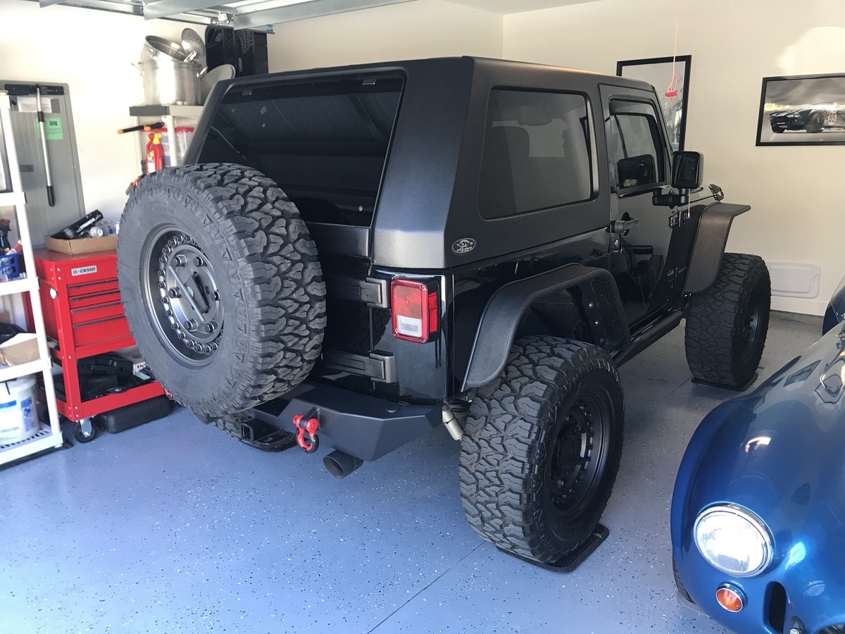 Looking for compatible tire carrier for RockBrawler rear bumper | Jeep ...