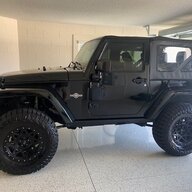 Where is the factory satellite tuner located? | Jeep Wrangler JK Forum